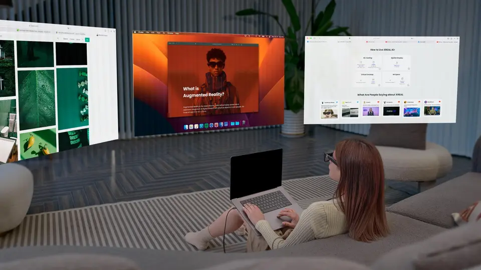 Woman using Virtual Desktop with XREAL Air AR Glasses